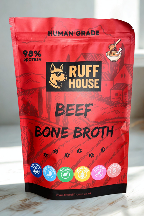 Ruff House Beef Bone Broth front of pack showing the red human grade 98 percent protein powder topper designed to boost hydration, support joints, and add savoury beef flavour to dog meals.